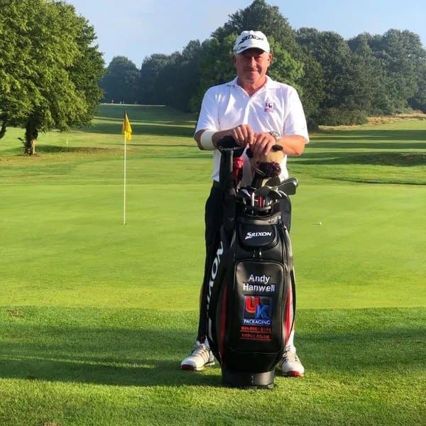 Andy Hanwell on the course with his golf bag